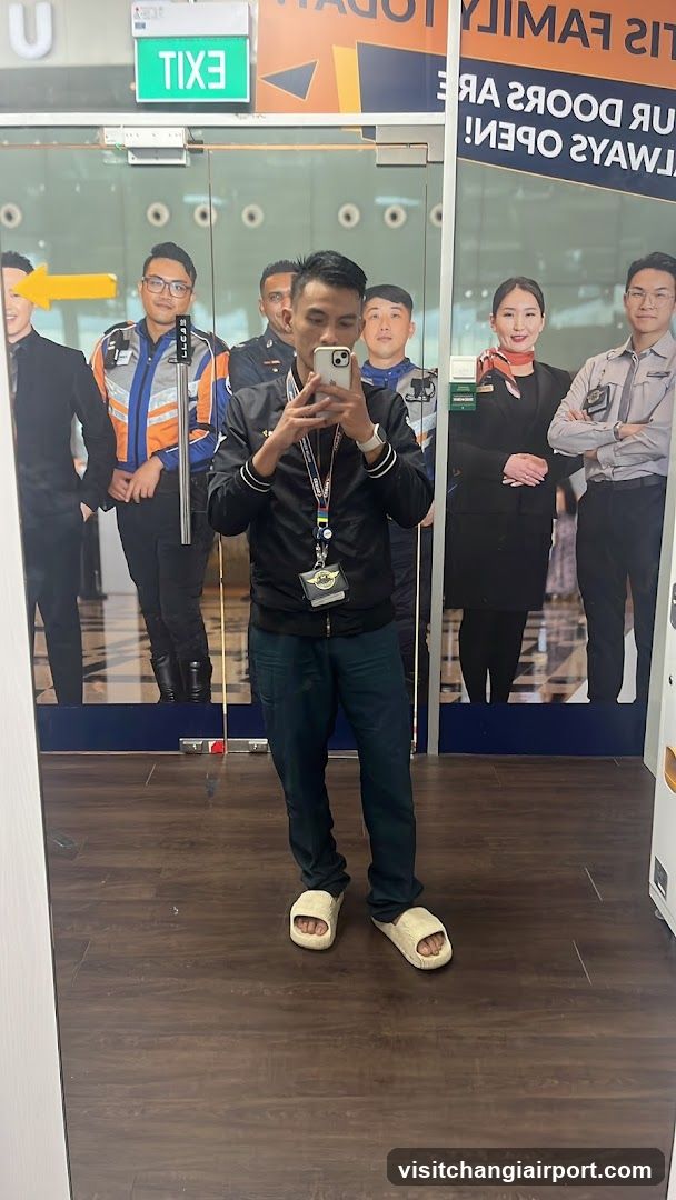 Mirror selfie in a commercial building entrance