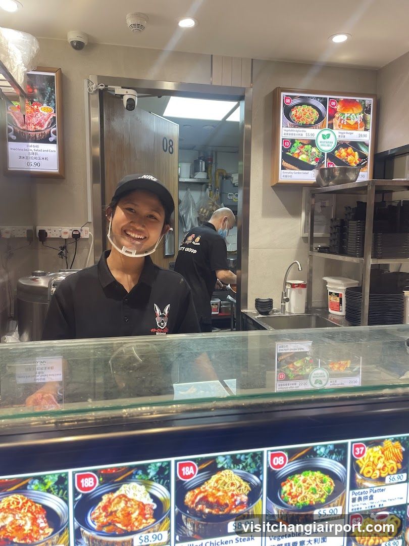 Food Stall Interior with Staff and Menu Display
