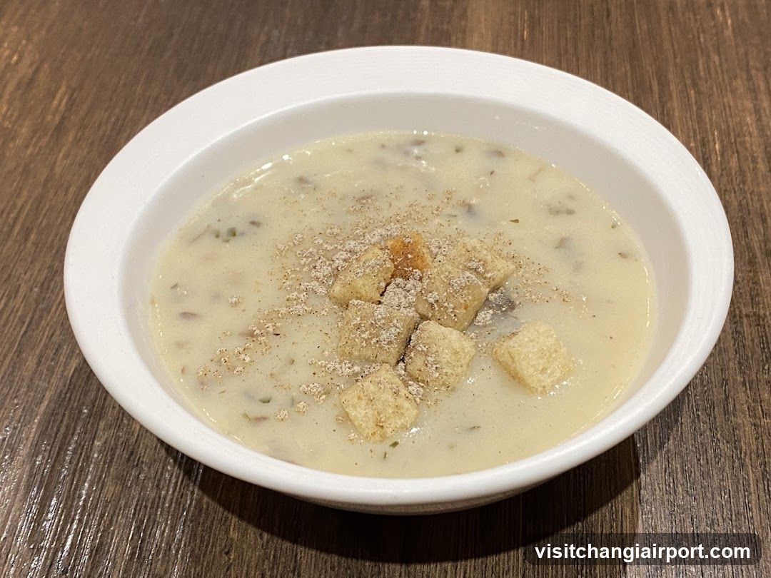 Bowl of Creamy Soup with Croutons