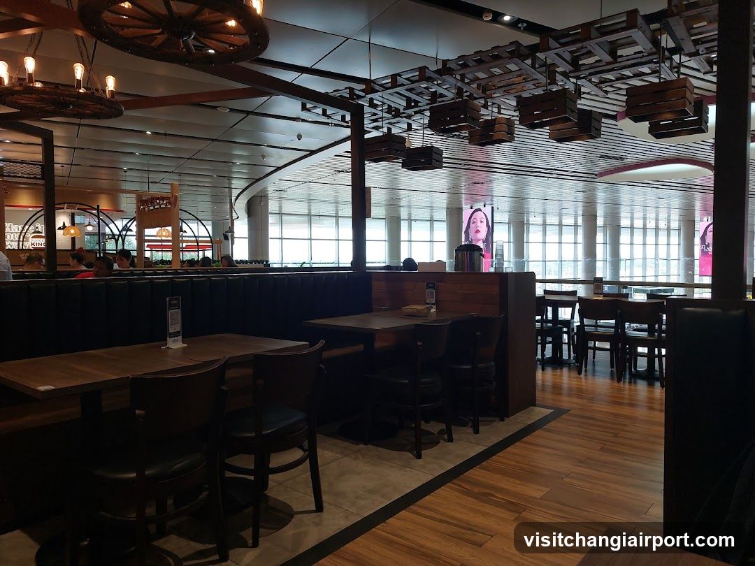 Restaurant Interior with Booth Seating and Decorative Ceiling Elements
