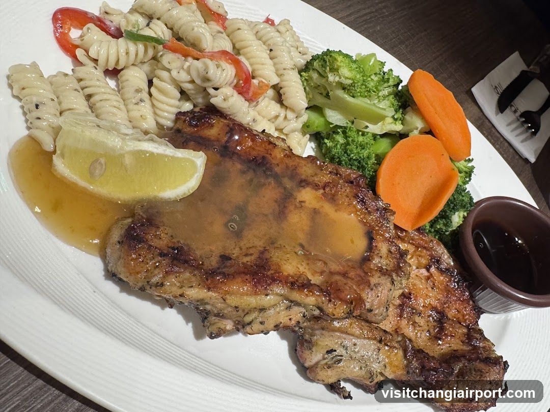 Grilled Pork Chop with Pasta and Vegetables