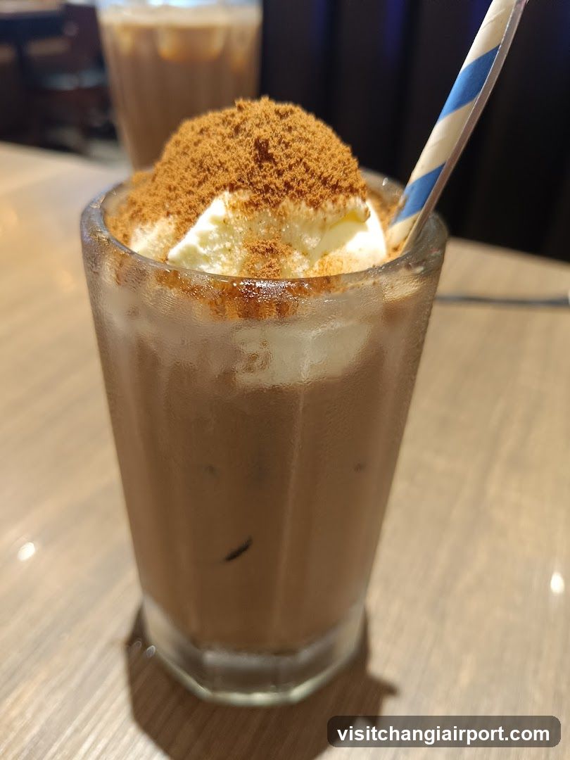 Iced Coffee with Whipped Cream and Cinnamon