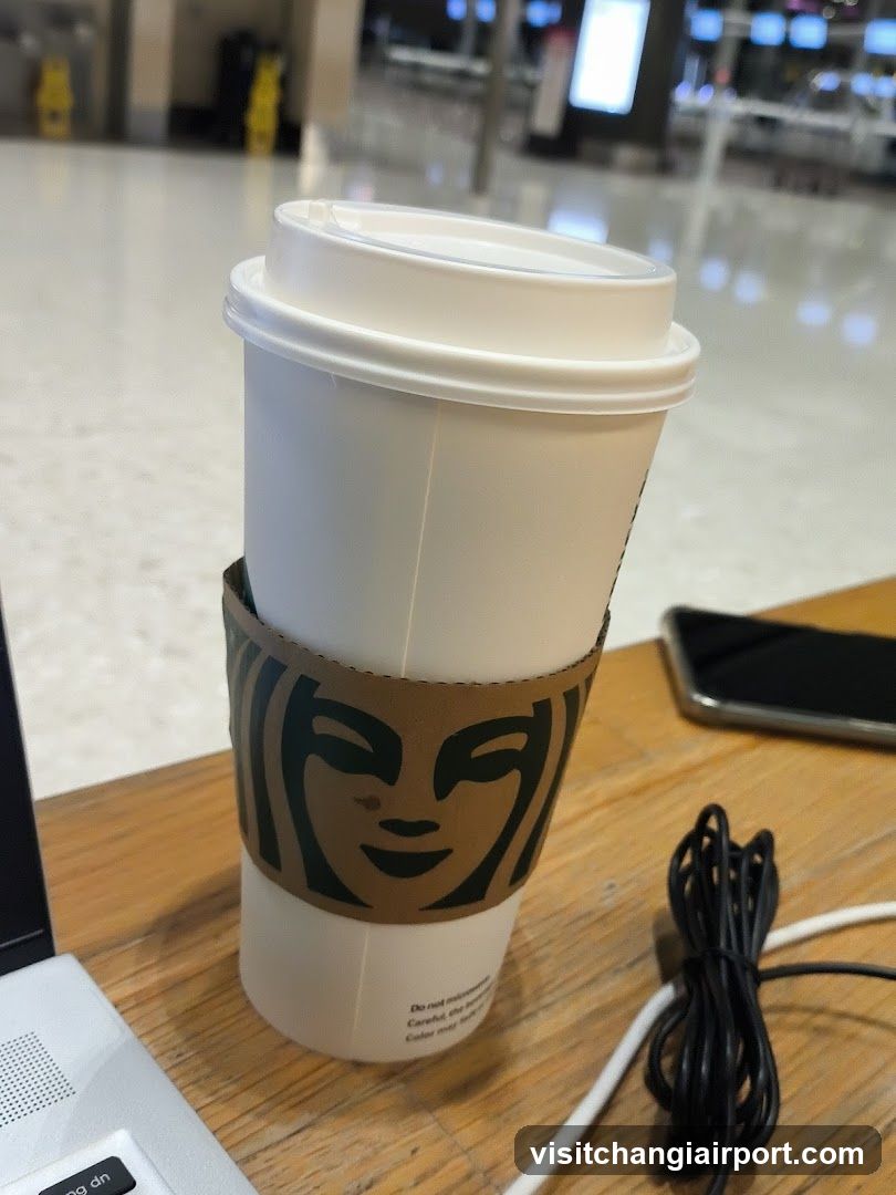Starbucks Coffee Cup at Airport Terminal