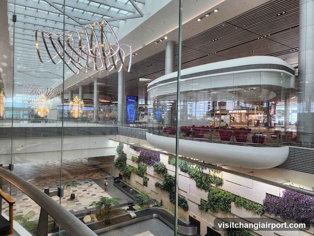 Modern Airport Interior with Greenery and Art Installations