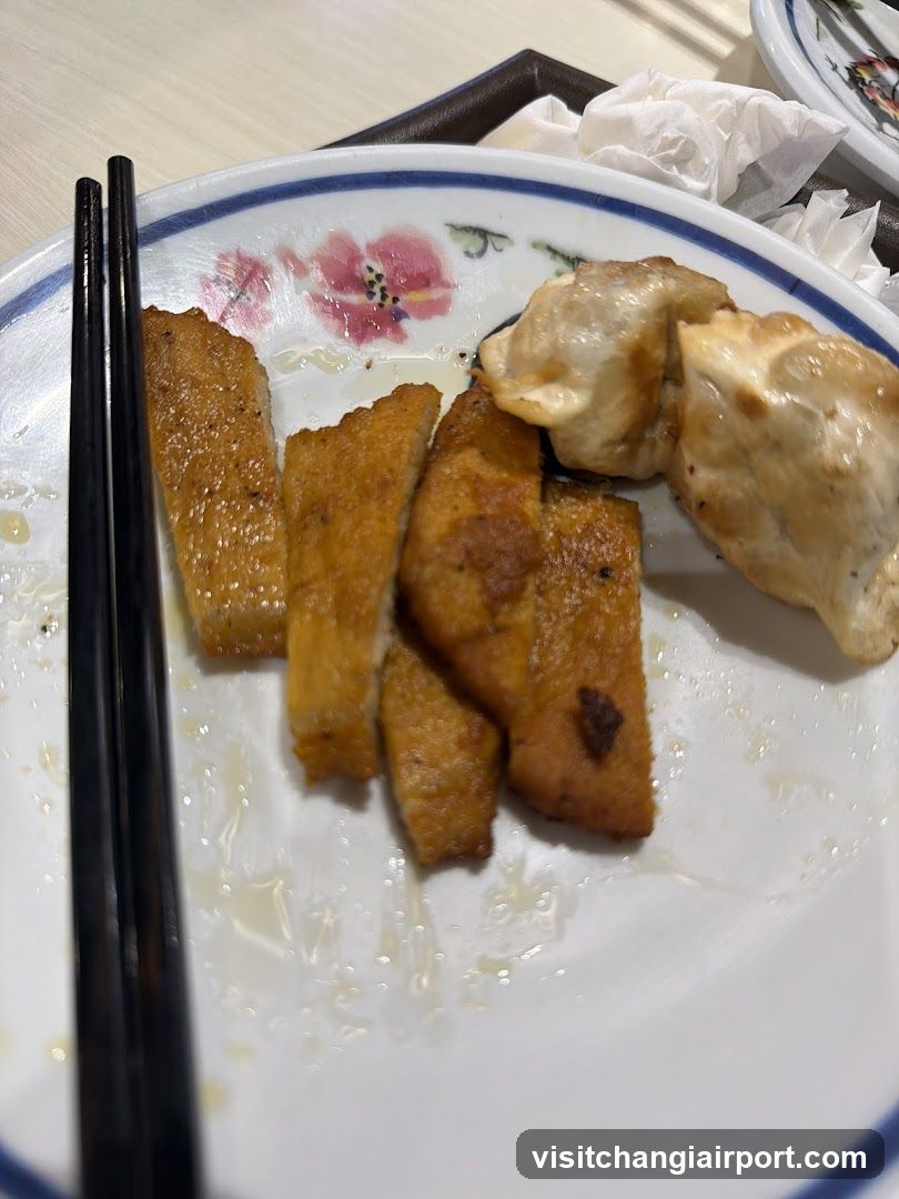 Plate of Fried Food and Dumplings