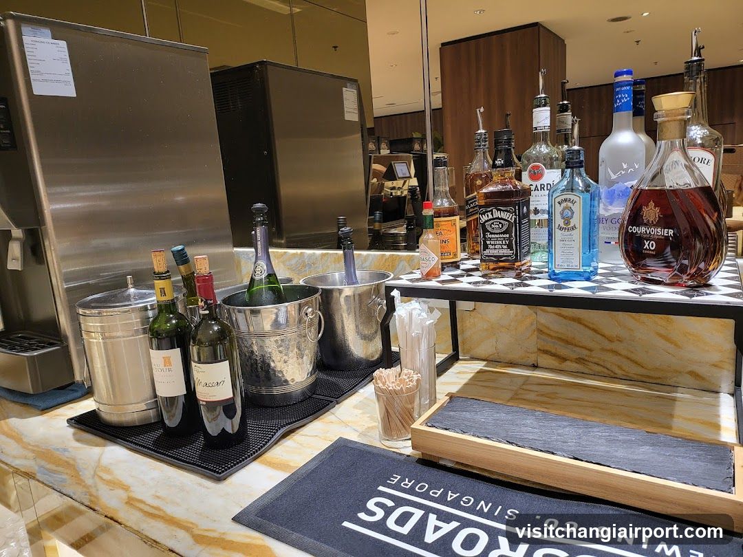 Bar Counter with Bottles and Ice Buckets