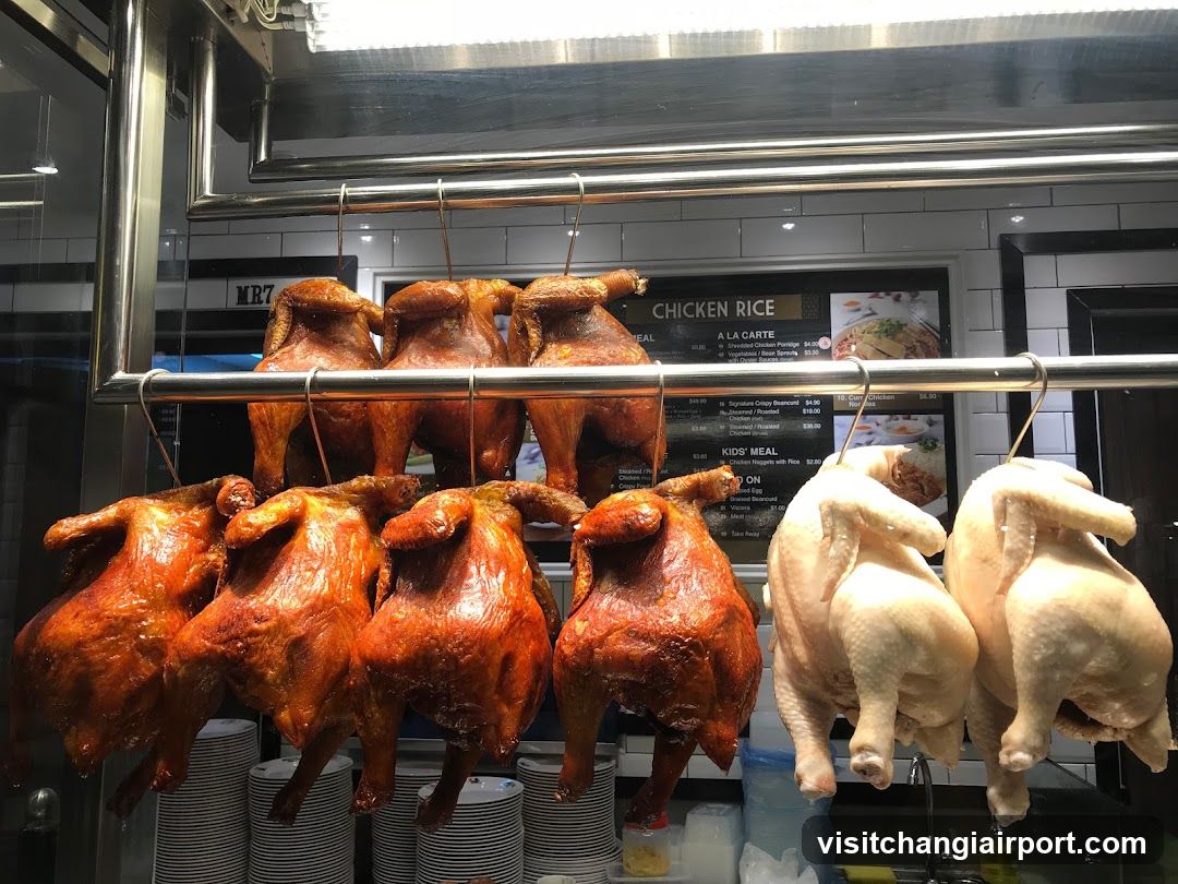 Hanging Roasted and Raw Chickens