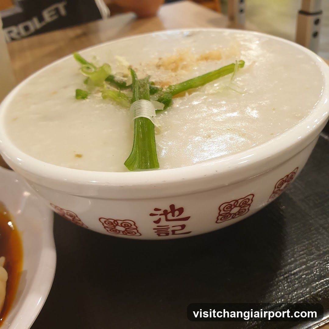 Bowl of congee with green onions