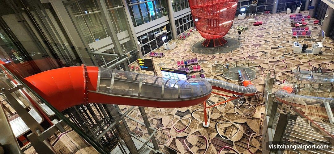 Airport Terminal Interior with Red Tube Structure