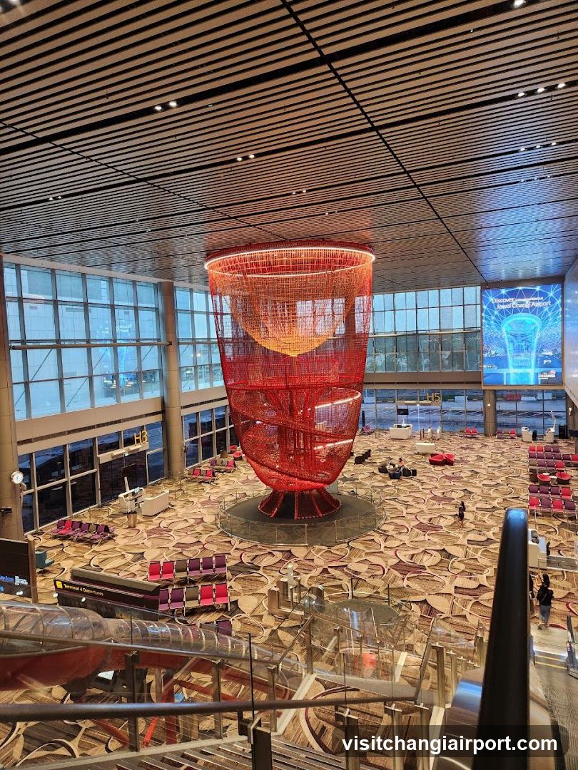 Red Sculpture in Airport Terminal