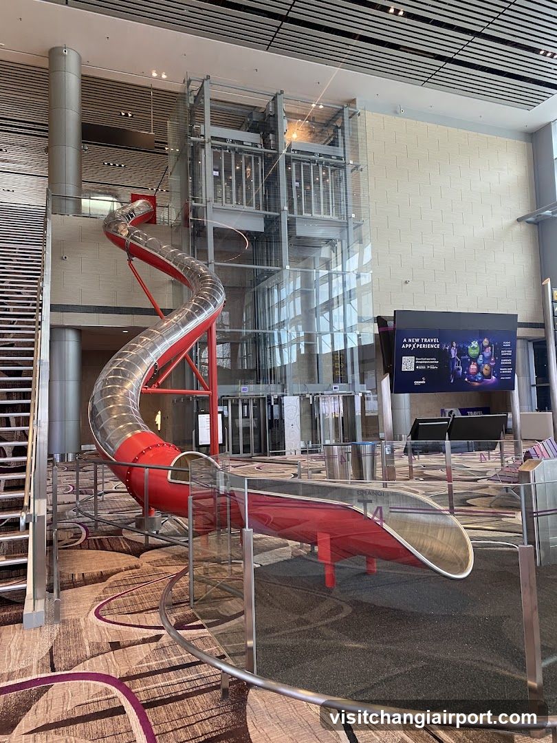 Airport Interior with Slide and Elevator