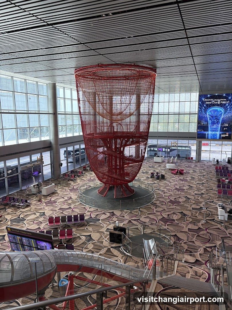 Airport Terminal Interior with Red Spiral Structure