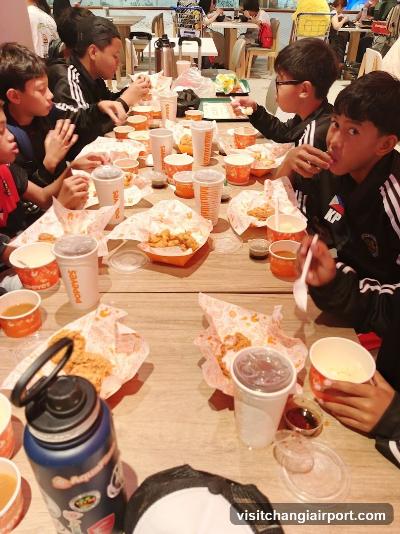 Group eating at Popeyes