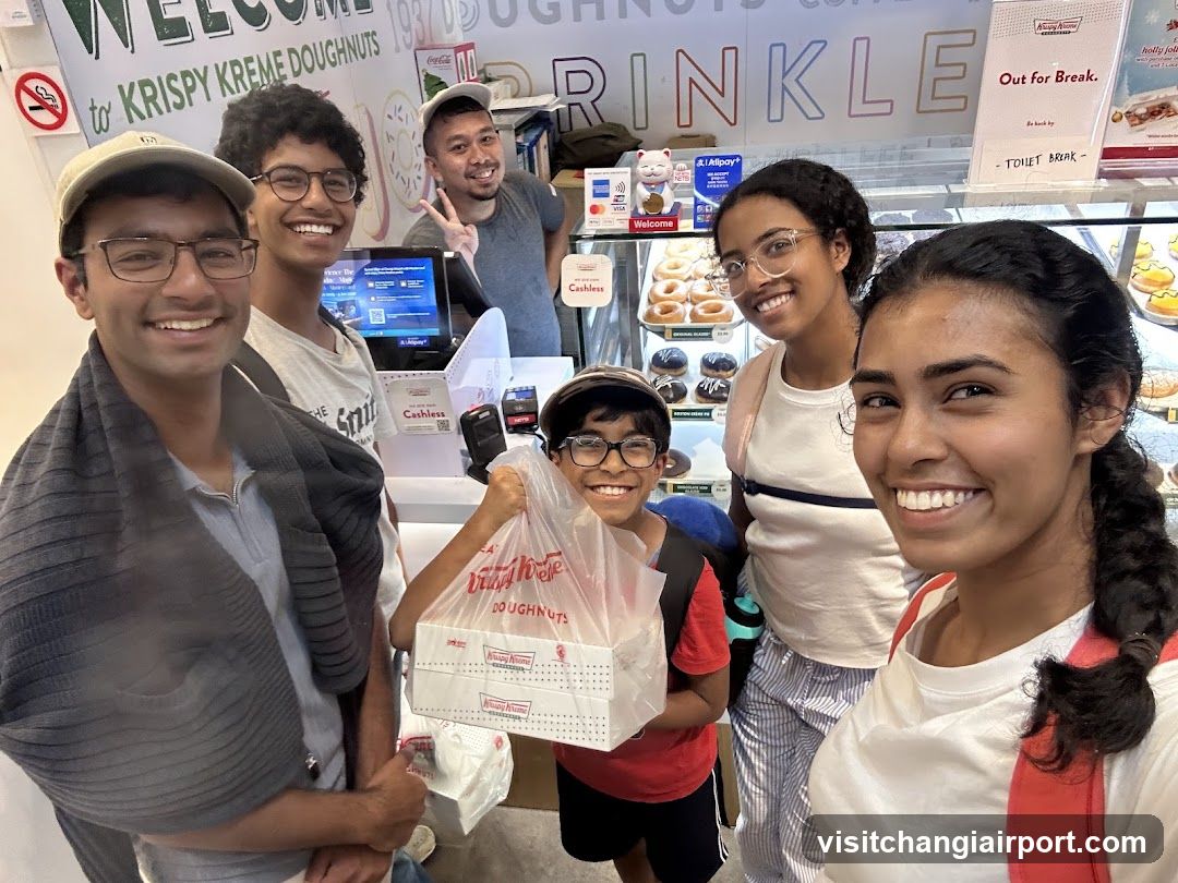 Group at Krispy Kreme Doughnuts Shop Interior