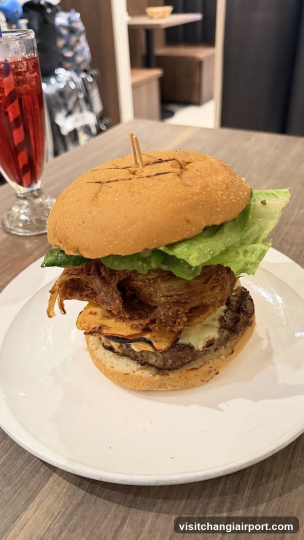 Burger with Fried Onions and Drink