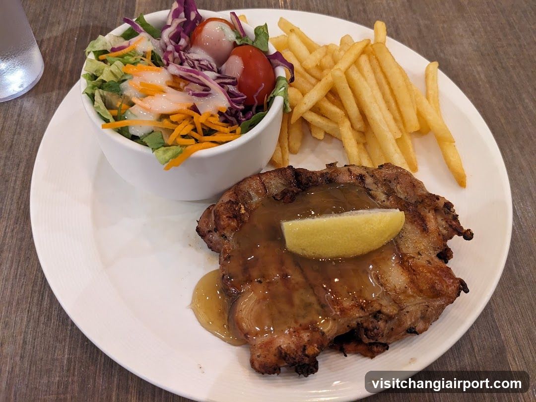 Grilled Pork Chop with Fries and Salad