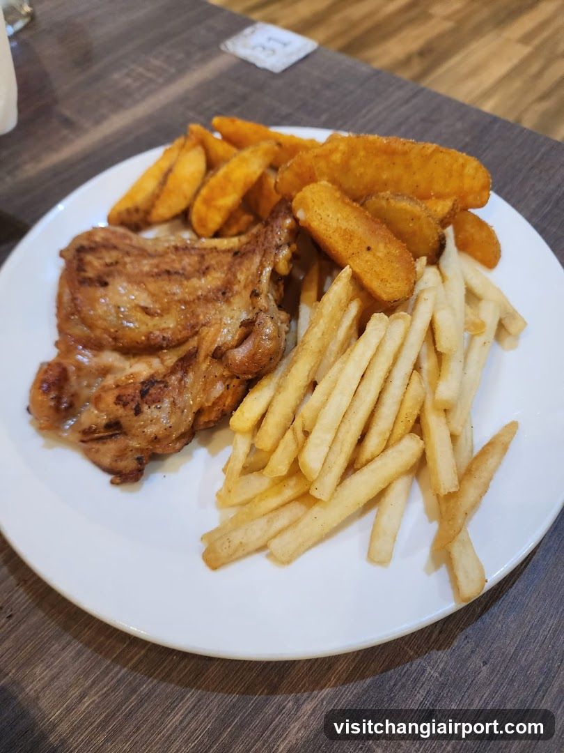 Pork Chop with Fries and Potato Wedges