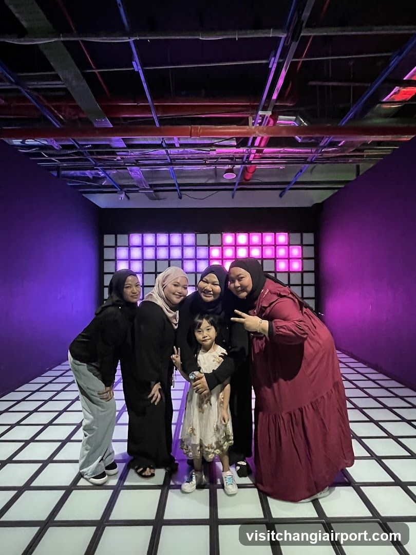 Group Photo in Neon-Lit Room