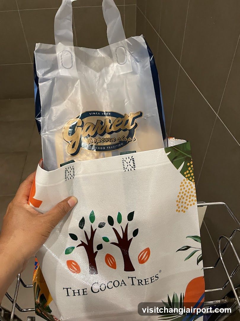 Shopping bags with Garrett popcorn and Cocoa Trees branding
