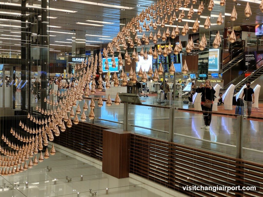 Airport Terminal Interior with Hanging Art Installation