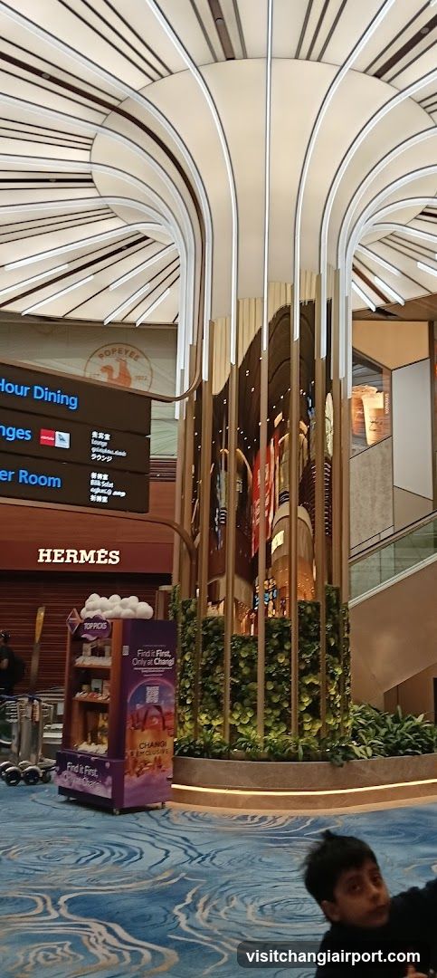 Airport Terminal Interior with Hermes Storefront