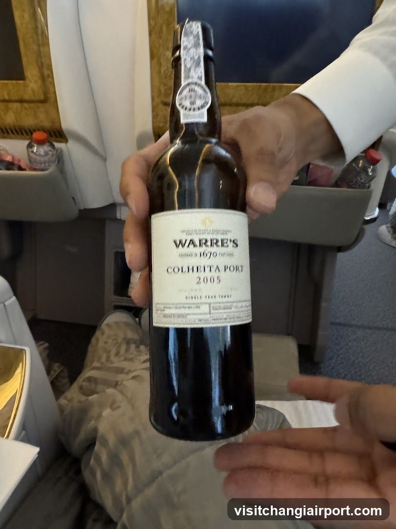 Bottle of Warre's Colheita Port on a plane