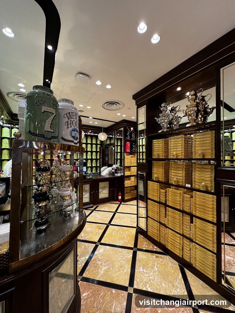 Interior of a tea shop with golden boxes and jars