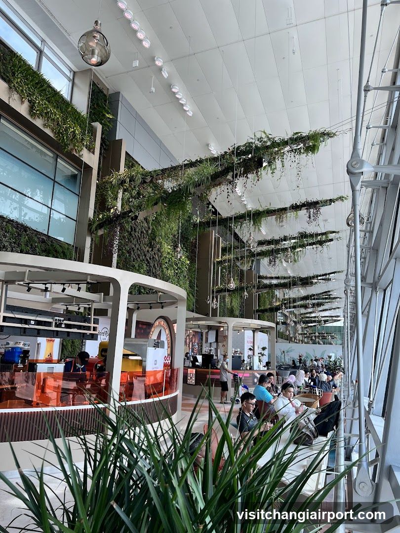 Modern Interior with Greenery and Seating Area