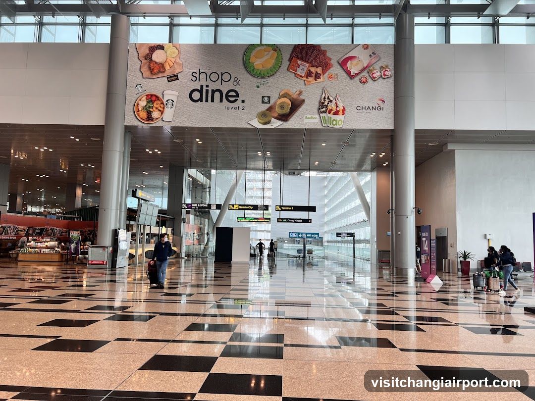 Airport Terminal Interior with Food Court Signage