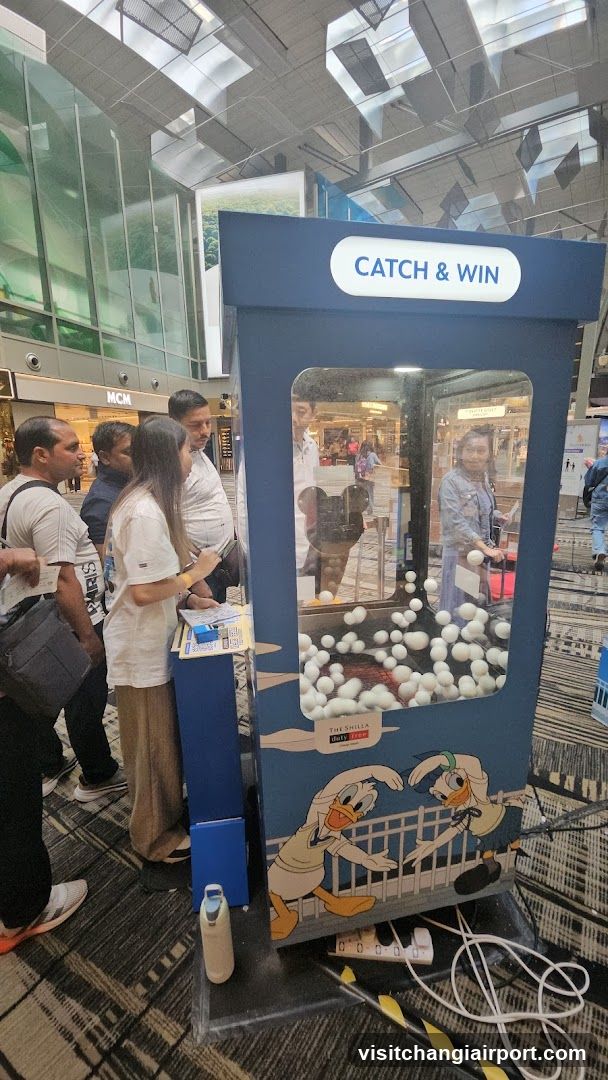 CATCH & WIN Game Booth at Airport Terminal