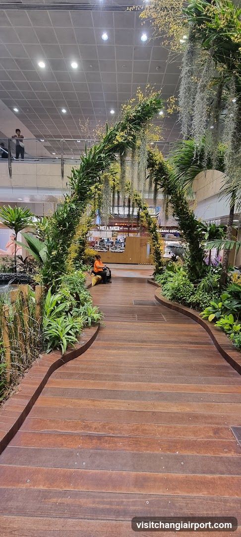 Indoor Garden Pathway with Staff Cleaning