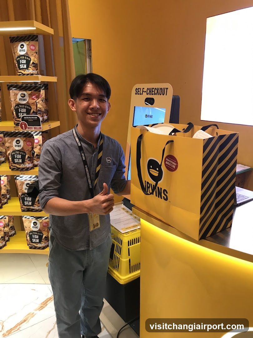 Staff with Self-Checkout Kiosk