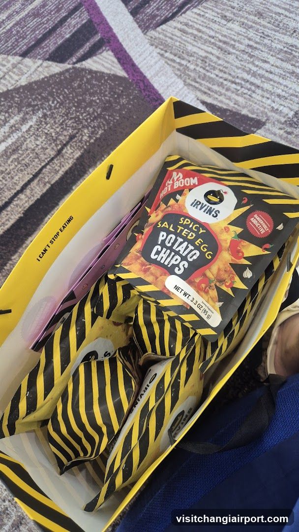 Irvin's Hot Boom Spicy Salted Egg Potato Chips in a shopping bag