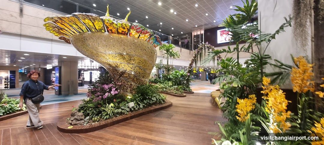 Indoor Garden Display with Large Sculpture