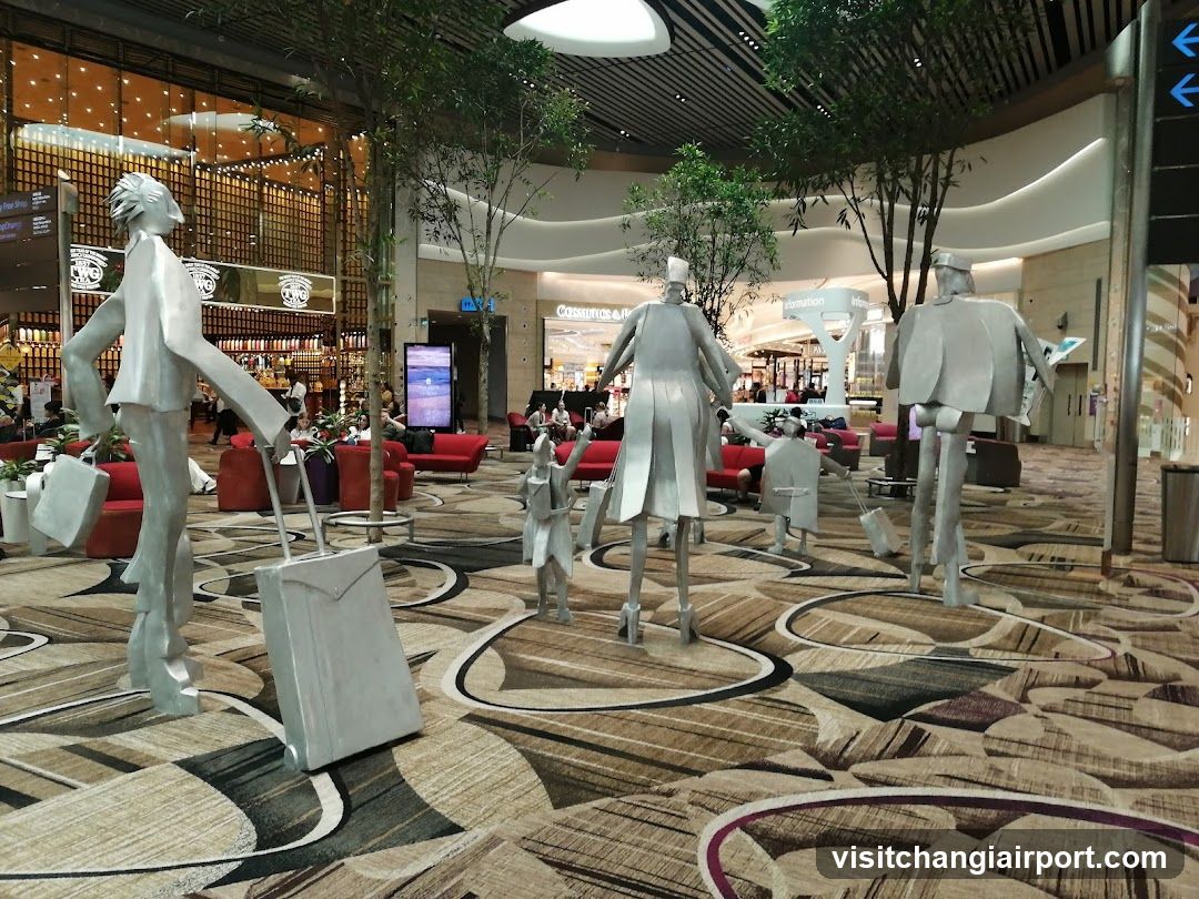 Traveler Sculptures in Airport Terminal