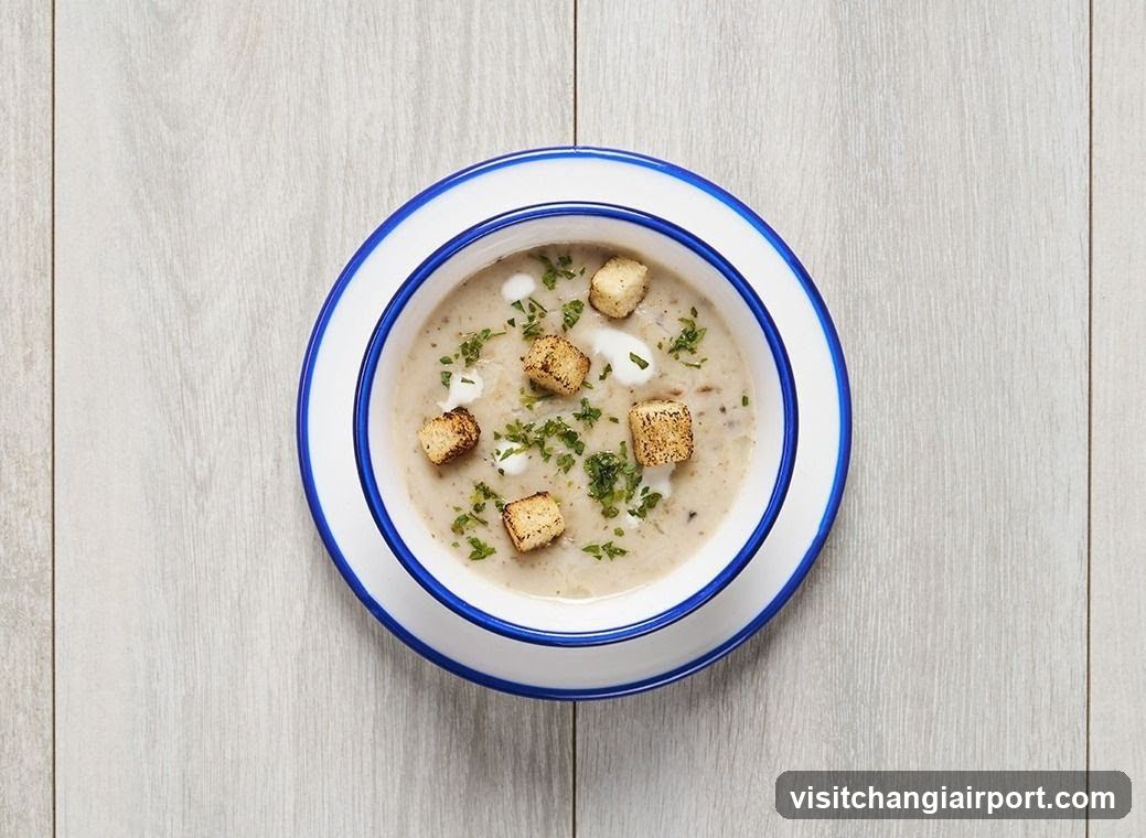 Creamy Soup with Croutons and Herbs