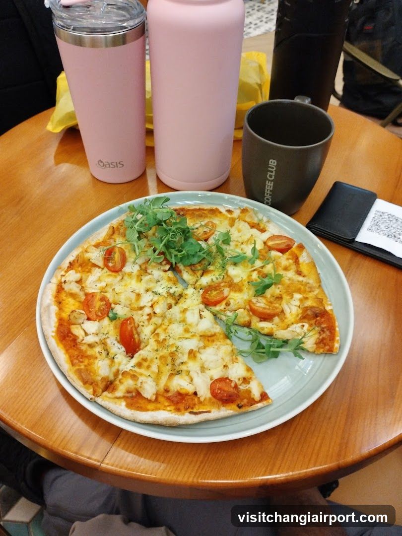 Pizza with Cherry Tomatoes and Arugula