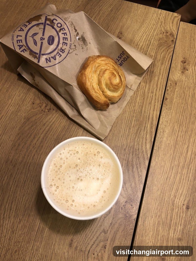 Coffee and Pastry on Wooden Table