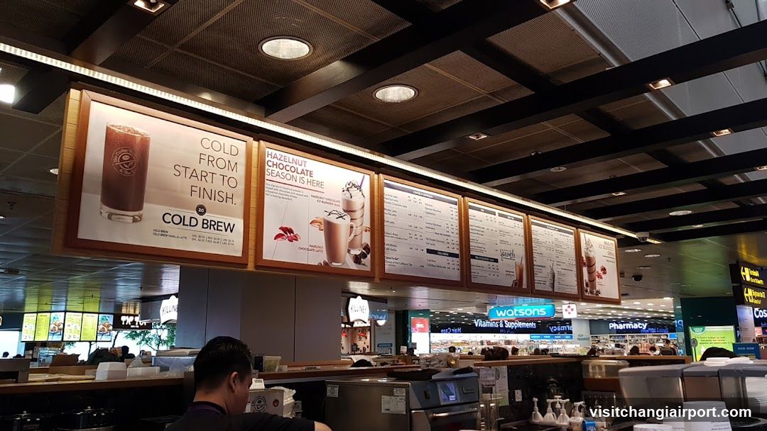 Coffee Shop Interior with Menu Boards