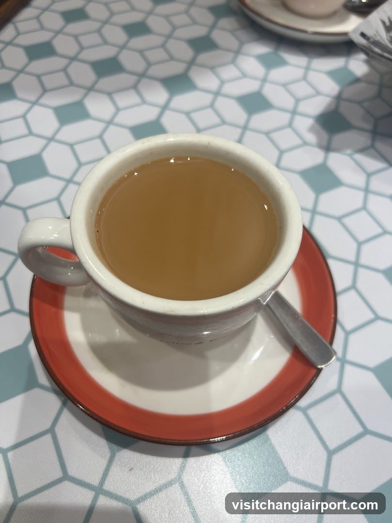 Cup of tea on patterned table