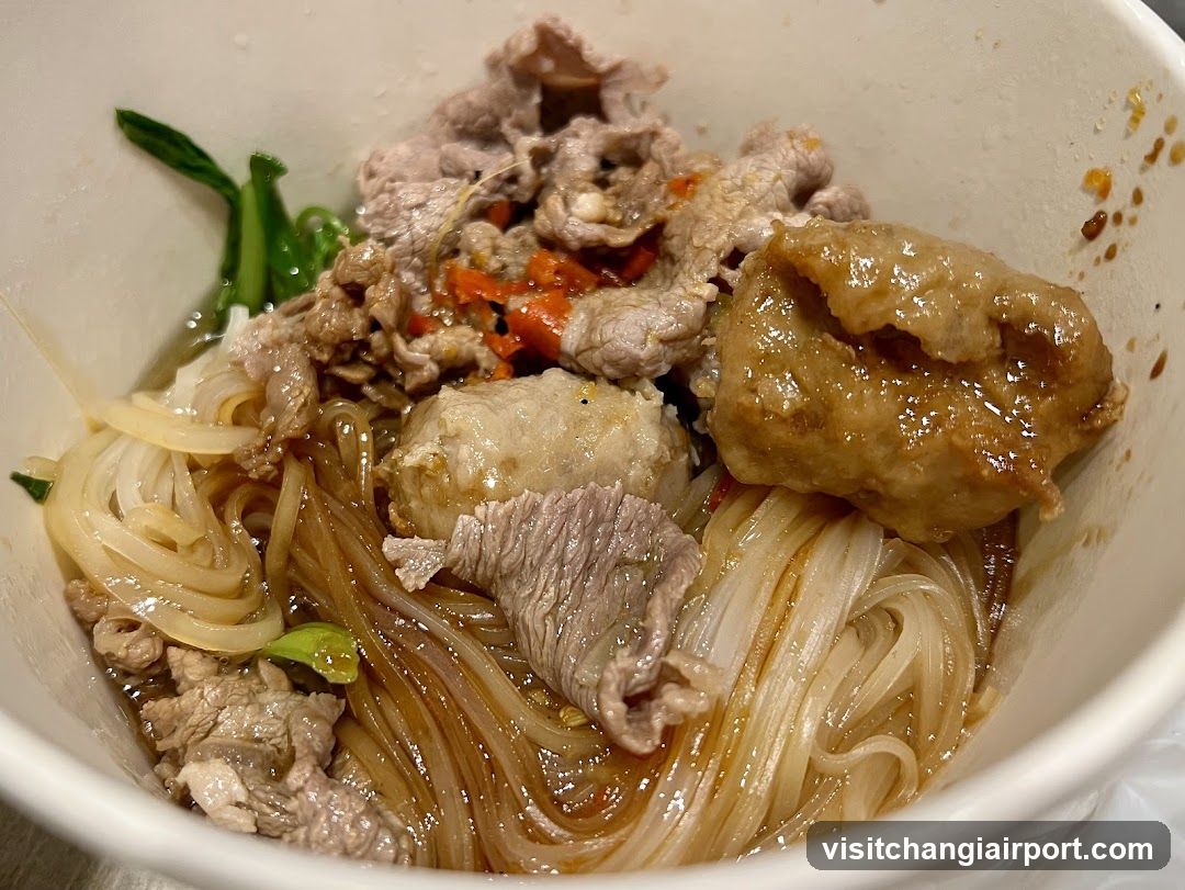 Bowl of Noodles with Meat and Vegetables