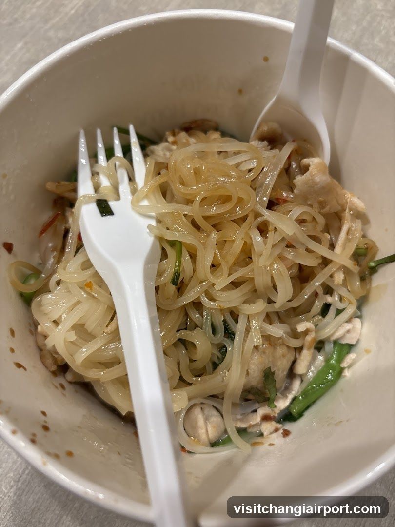Noodle Bowl with Chopsticks and Fork