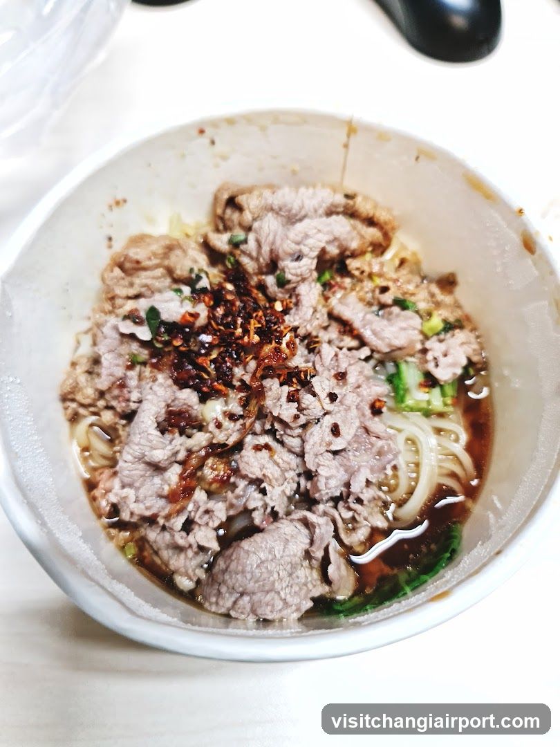 Bowl of Noodles with Meat and Chili Oil
