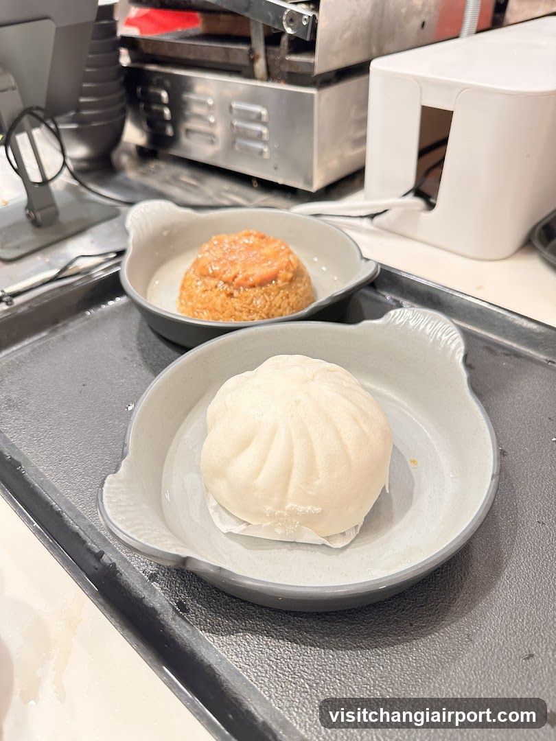 Bun and Rice Dish on Tray
