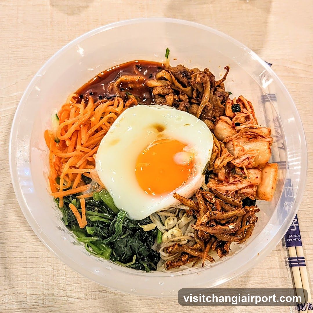Bowl of Korean-style noodles with egg and toppings