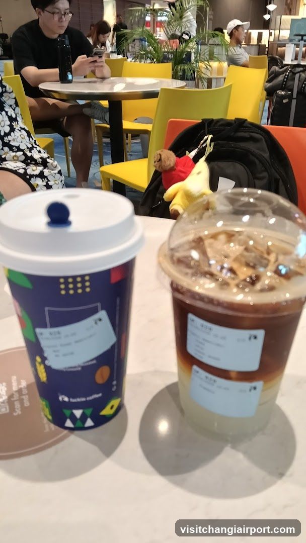 Coffee Shop Interior with Drinks and Customers