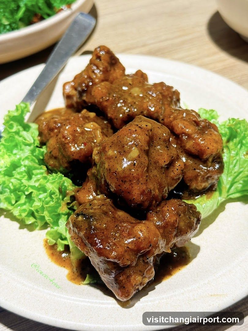 Sauced Meat Dish with Lettuce Garnish
