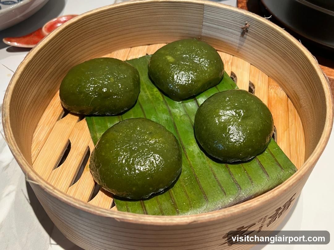 Green Steamed Dumplings in Bamboo Basket