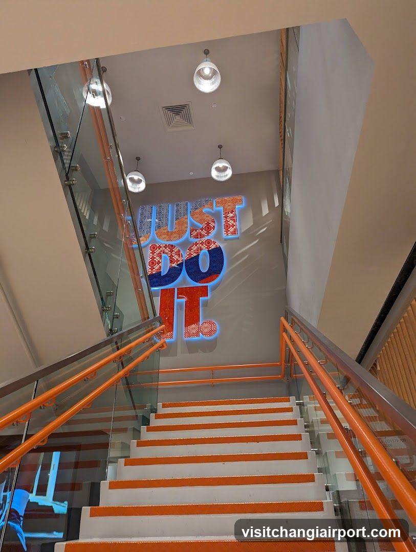 Staircase with 'Just Do It' Signage
