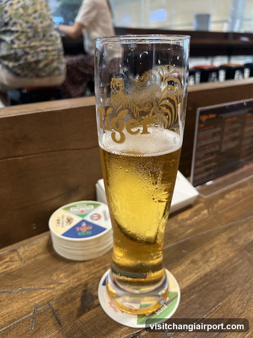 Tiger Beer Glass on Wooden Table
